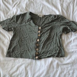 Cropped green button up top